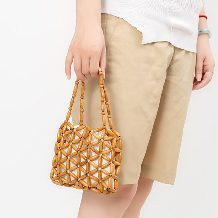 Sac à main en mini perles en bois tissées à la main Buddha Stones
