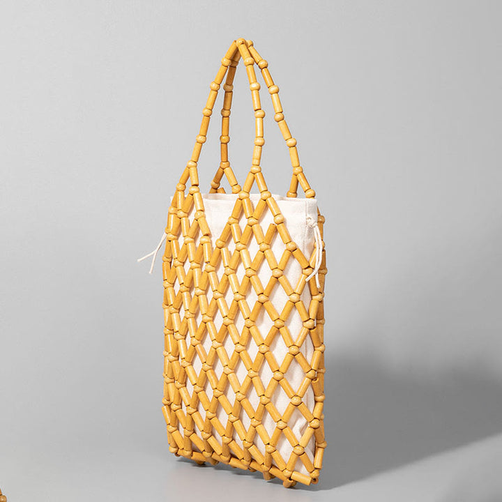 Sac à main en perles creuses en bois tissées à la main avec Buddha Stones