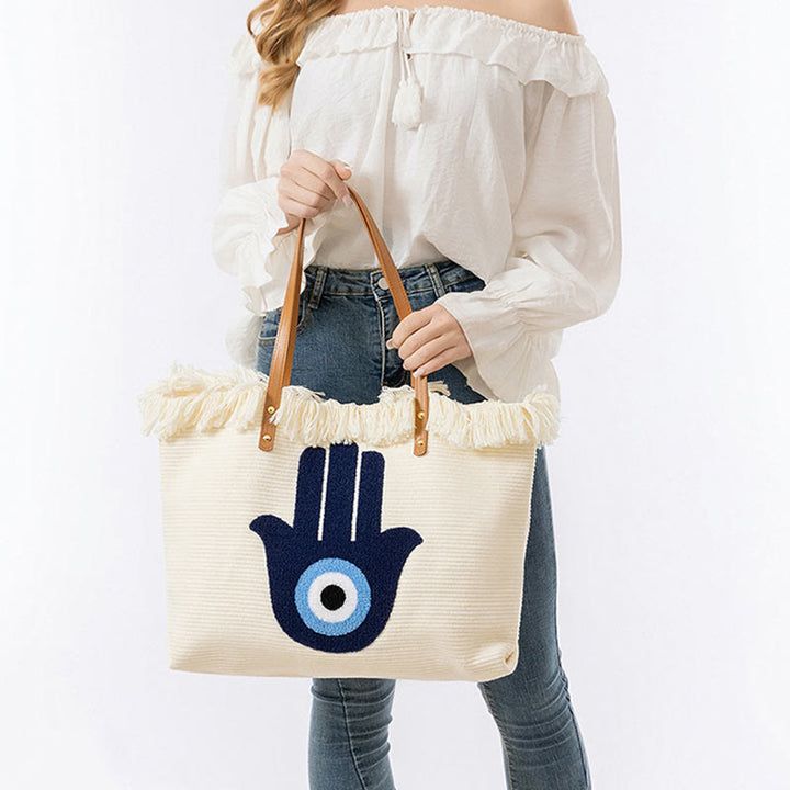 Sac fourre-tout en toile à pompon avec motif de feuilles de Buddha Stones et de mauvais œil de grande capacité
