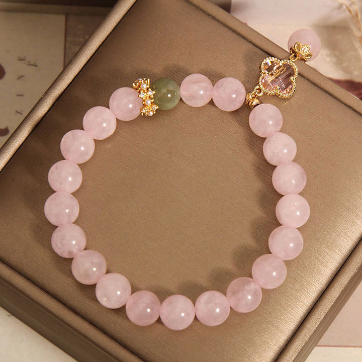 Bracelet apaisant en cristal rose naturel avec trèfle à quatre feuilles de Buddha Stones