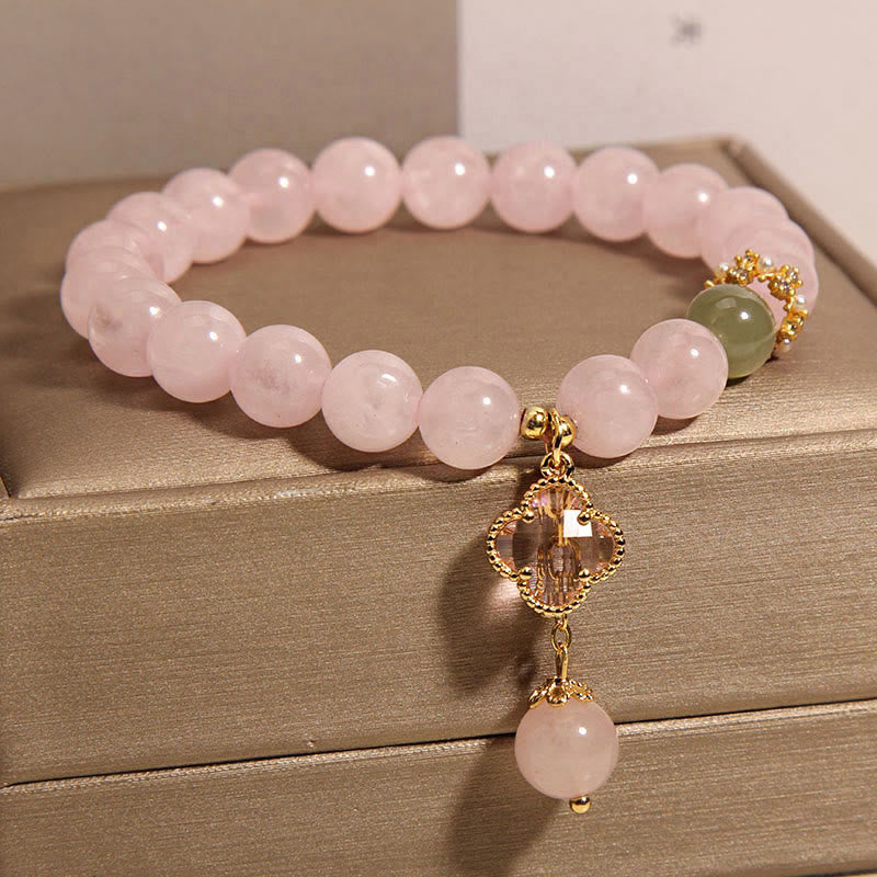 Bracelet apaisant en cristal rose naturel avec trèfle à quatre feuilles de Buddha Stones - image 2