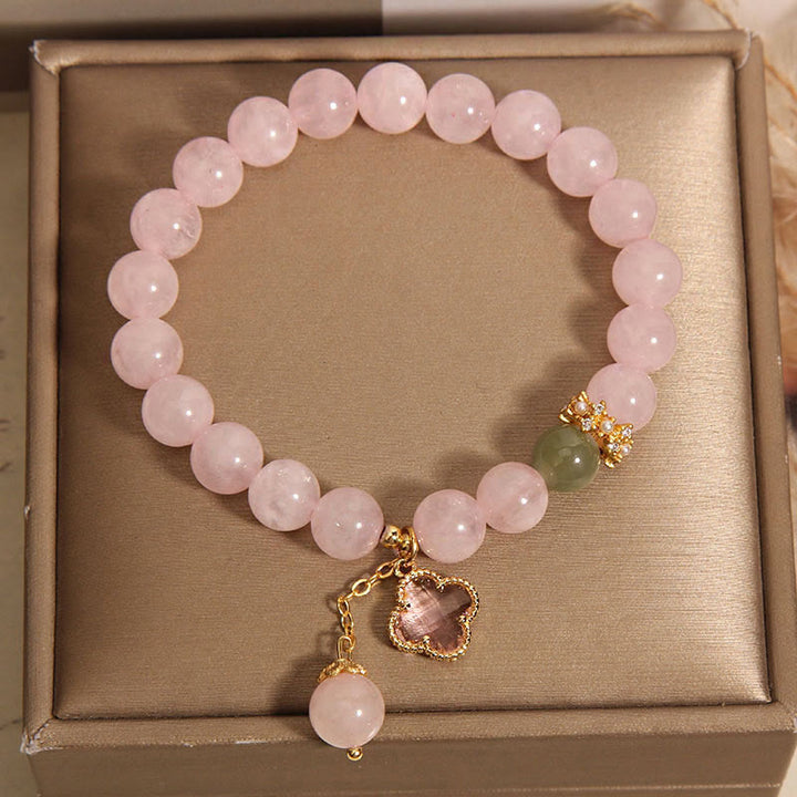 Bracelet apaisant en cristal rose naturel avec trèfle à quatre feuilles de Buddha Stones