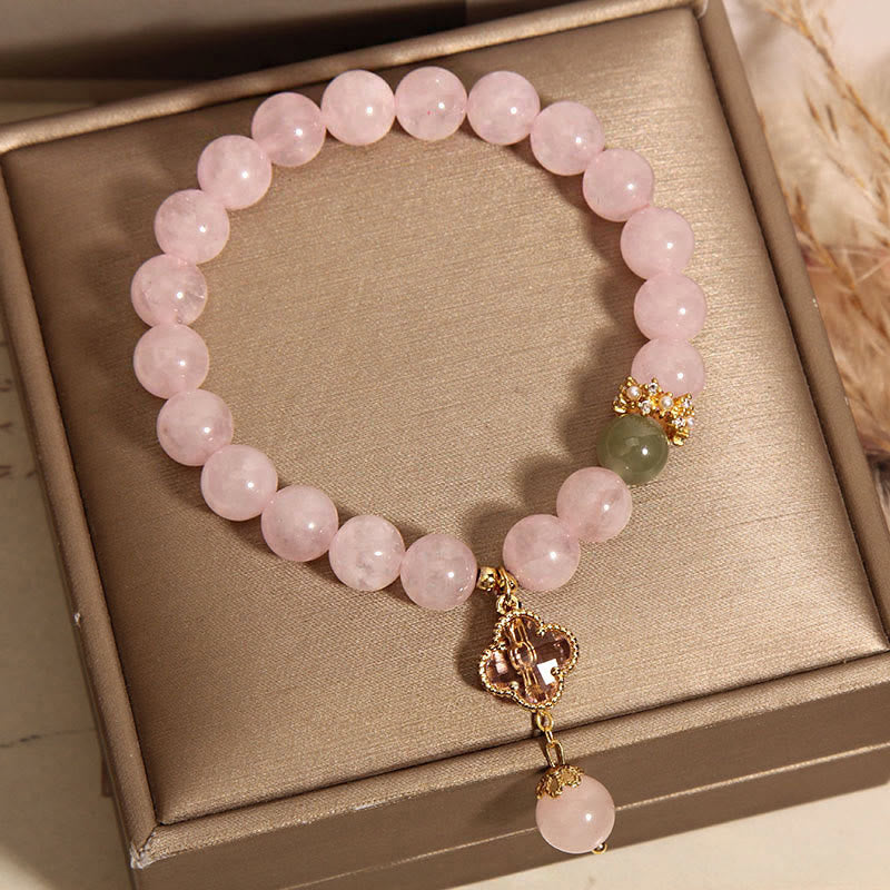 Bracelet apaisant en cristal rose naturel avec trèfle à quatre feuilles de Buddha Stones