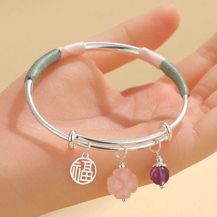 Bracelet jonc avec boucle de paix en cristal rose et Buddha Stones