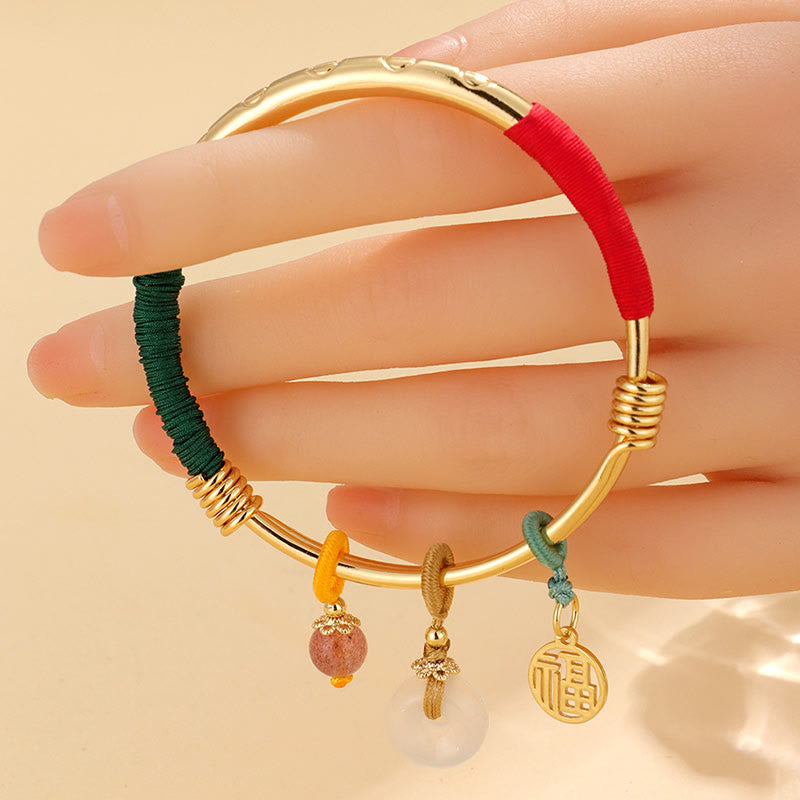 Bracelet jonc avec boucle de paix en cristal rose et Buddha Stones