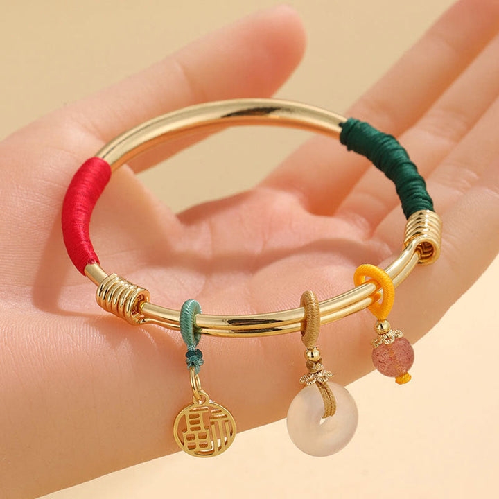 Bracelet jonc avec boucle de paix en cristal rose et Buddha Stones - image 2