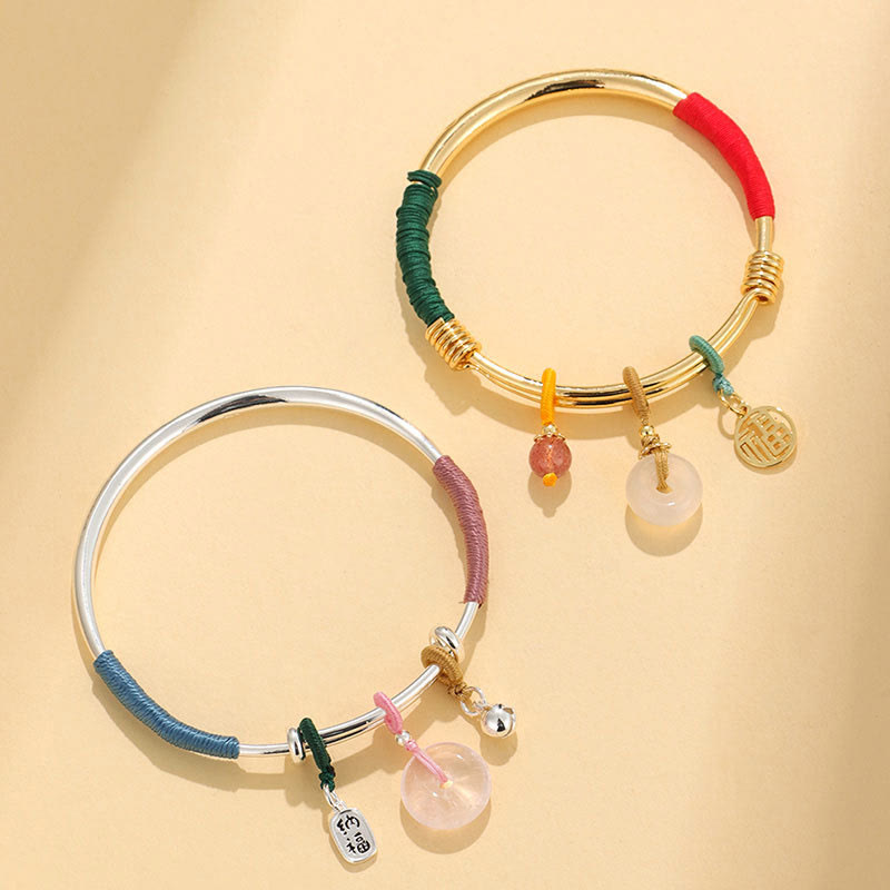 Bracelet jonc avec boucle de paix en cristal rose et Buddha Stones