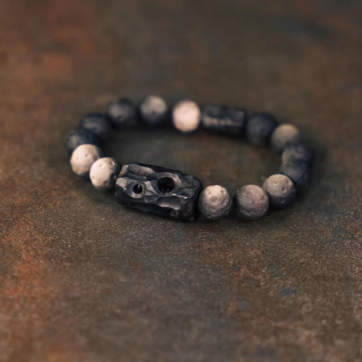 Bracelet apaisant en bois d'ébène et obsidienne argentée avec Buddha Stones