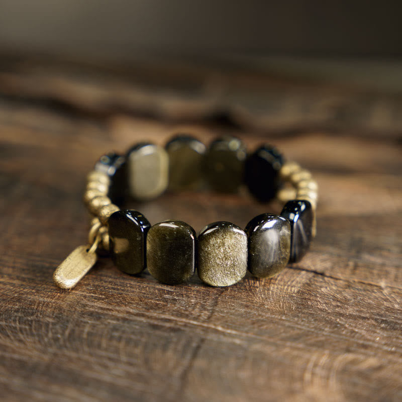 Bracelet renforcé en obsidienne noire et dorée avec Buddha Stones