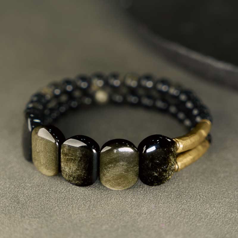 Bracelet renforcé en obsidienne noire et dorée avec Buddha Stones