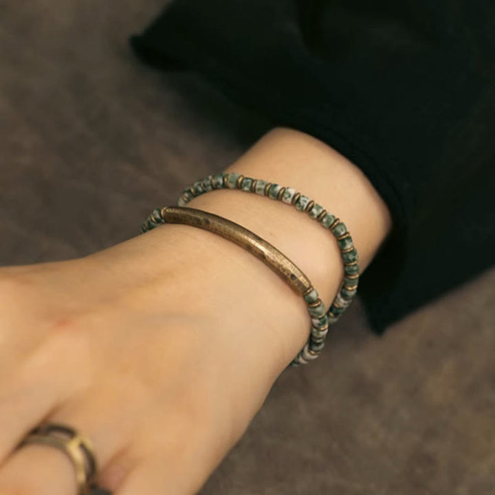 Bracelet de sagesse et d'harmonie en Buddha Stones avec image de sodalite et jaspe vert