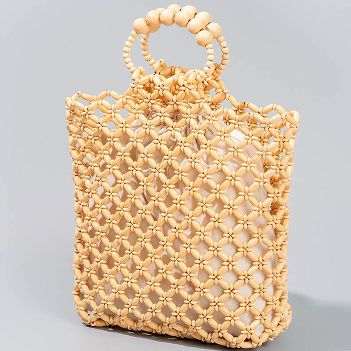 Sac à main en perles de bois creuses en maille tressée avec fil de pêche tissé à la main en Buddha Stones