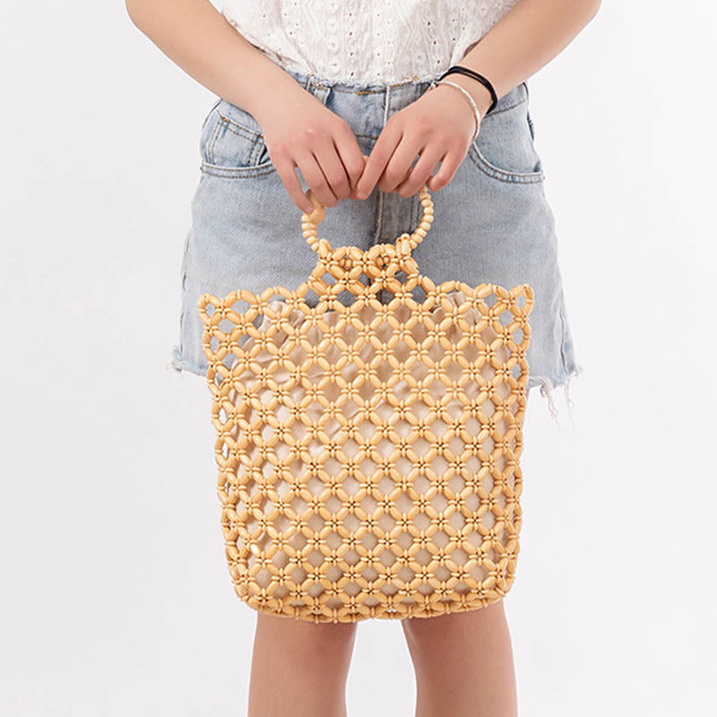 Sac à main en perles de bois creuses en maille tressée avec fil de pêche tissé à la main en Buddha Stones