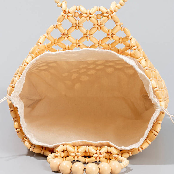 Sac à main en perles de bois creuses en maille tressée avec fil de pêche tissé à la main en Buddha Stones