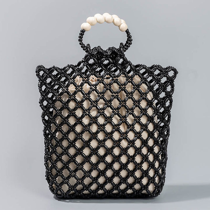 Sac à main en perles de bois creuses en maille tressée avec fil de pêche tissé à la main en Buddha Stones
