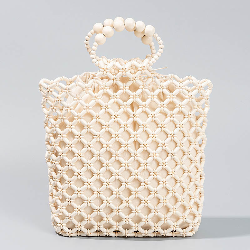 Sac à main en perles de bois creuses en maille tressée avec fil de pêche tissé à la main en Buddha Stones