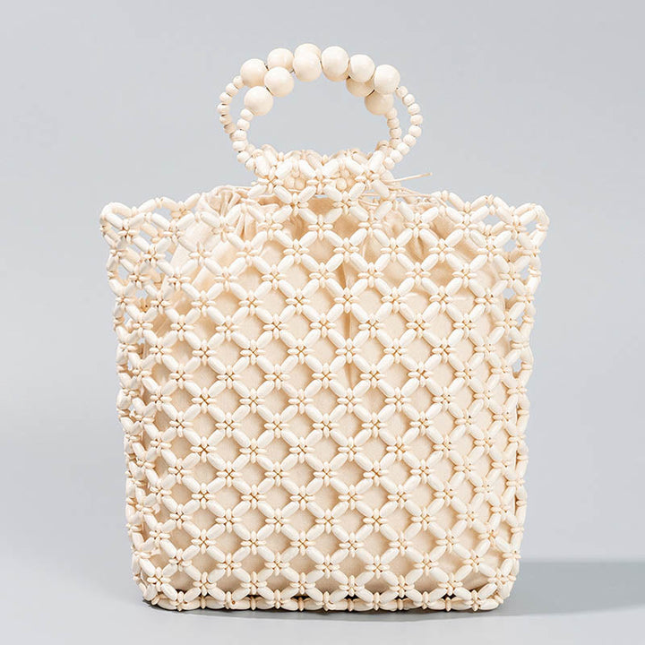 Sac à main en perles de bois creuses en maille tressée avec fil de pêche tissé à la main en Buddha Stones