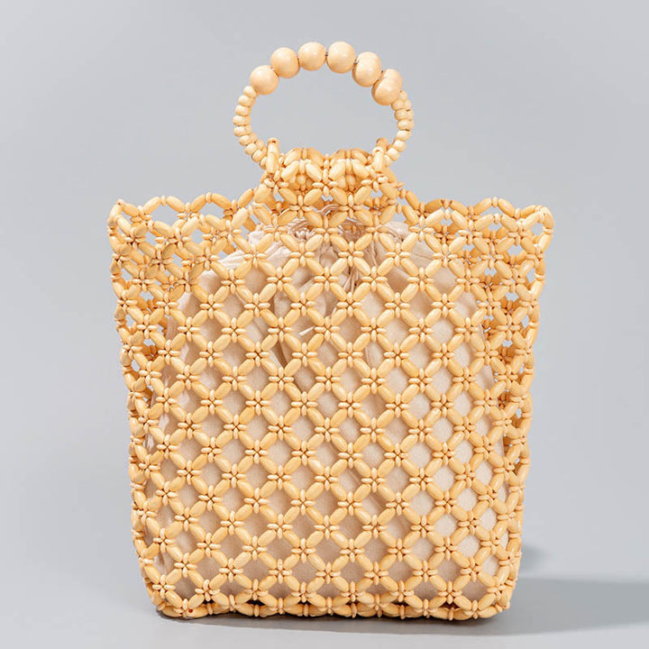 Sac à main en perles de bois creuses en maille tressée avec fil de pêche tissé à la main en Buddha Stones