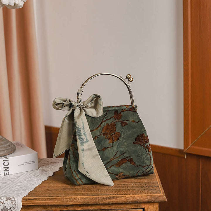 Sac à bandoulière en velours jacquard avec chaîne en métal Buddha Stones