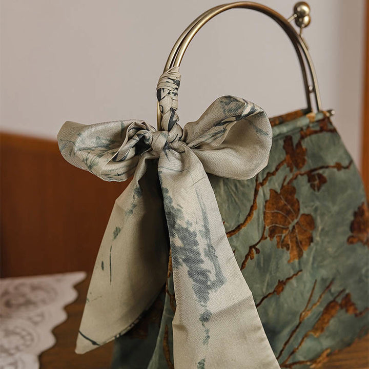 Sac à bandoulière en velours jacquard avec chaîne en métal Buddha Stones