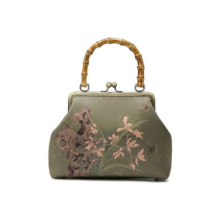 Sac à main en bandoulière avec chaîne en métal et poignée en bambou et Buddha Stones
