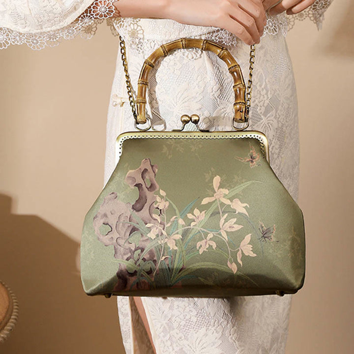 Sac à main en bandoulière avec chaîne en métal et poignée en bambou et Buddha Stones