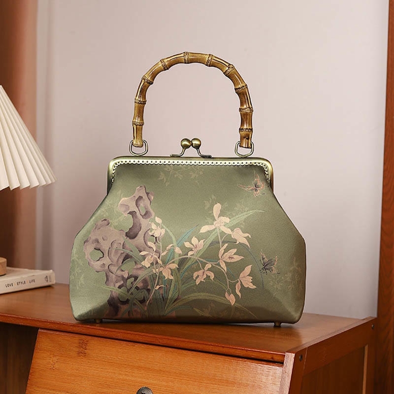 Sac à main en bandoulière avec chaîne en métal et poignée en bambou et Buddha Stones