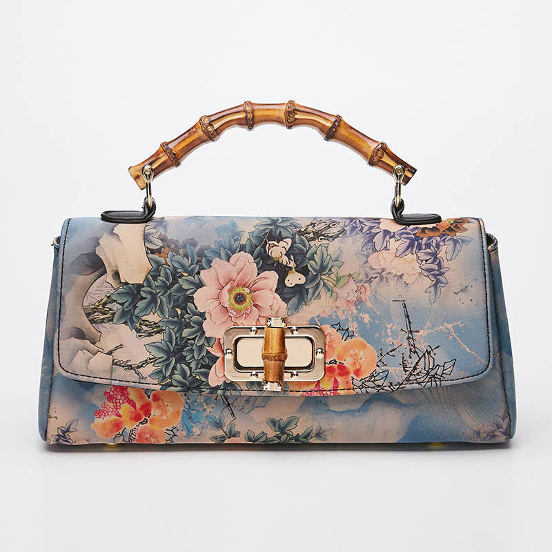 Sac à main à bandoulière avec chaîne en métal et poignée en bambou et motif floral Buddha Stones