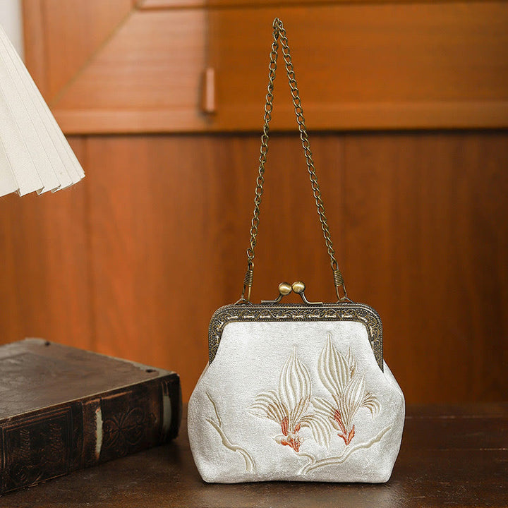 Sac à main avec poignée en métal et broderie de papillons et de pierres de Buddha Stones, orchidées, cerisier oriental