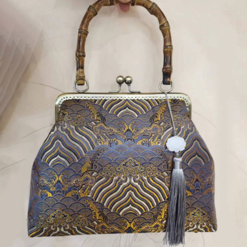Sac à main à bandoulière avec chaîne en métal et poignée en bambou Buddha Stones Silver Lines