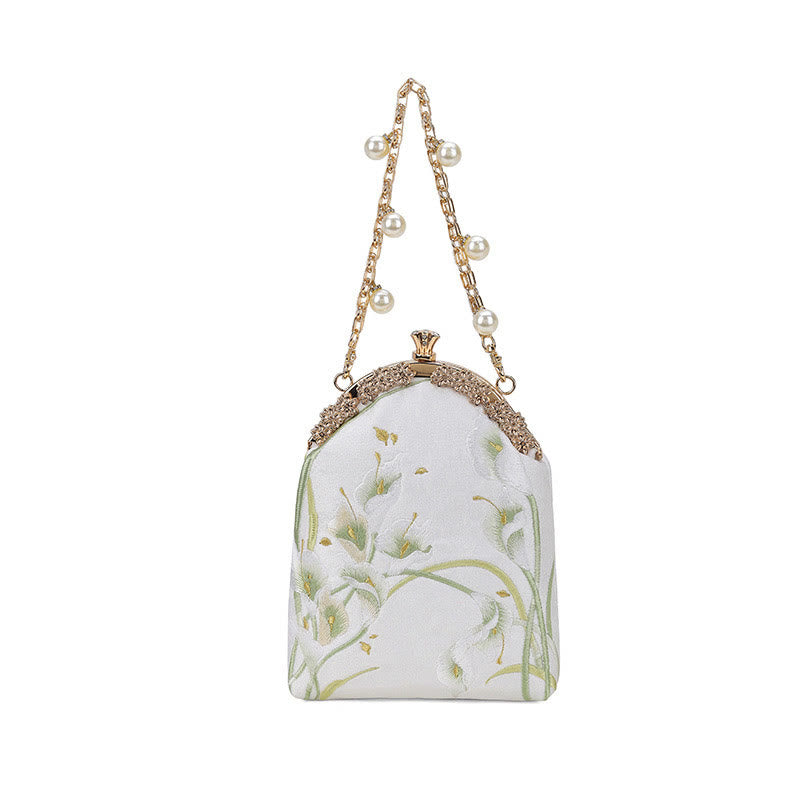 Sac à main avec poignée en métal et broderie Buddha Stones Calla