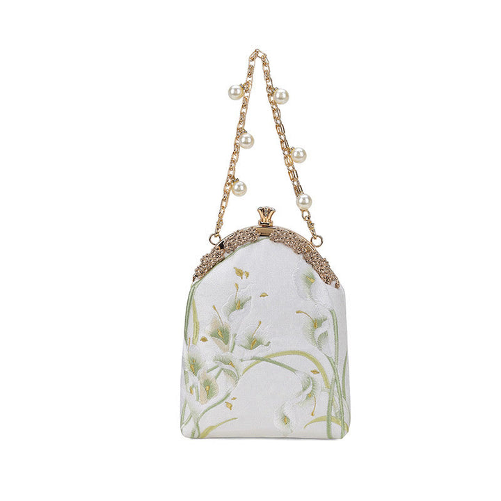 Sac à main avec poignée en métal et broderie Buddha Stones Calla