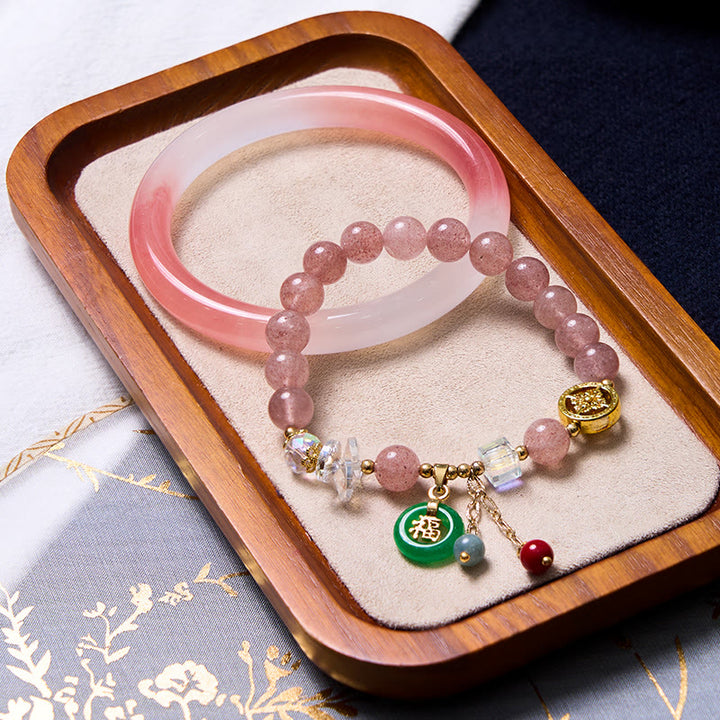 Bracelet rose avec Buddha Stones attirant l'amour et la protection