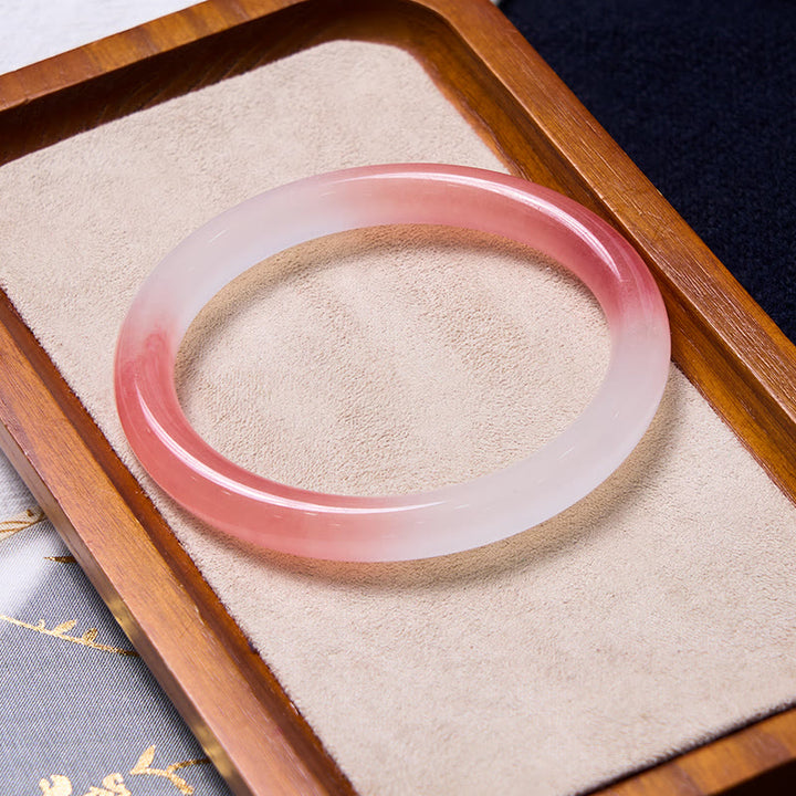 Bracelet rose avec Buddha Stones attirant l'amour et la protection