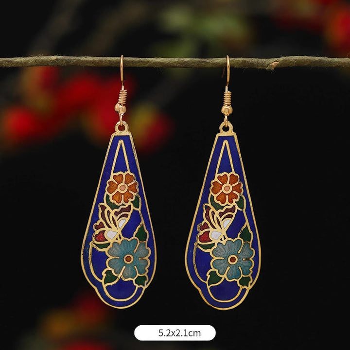 Boucles d'oreilles pendantes en alliage de cuivre avec Buddha Stones, fleur de lotus et papillon
