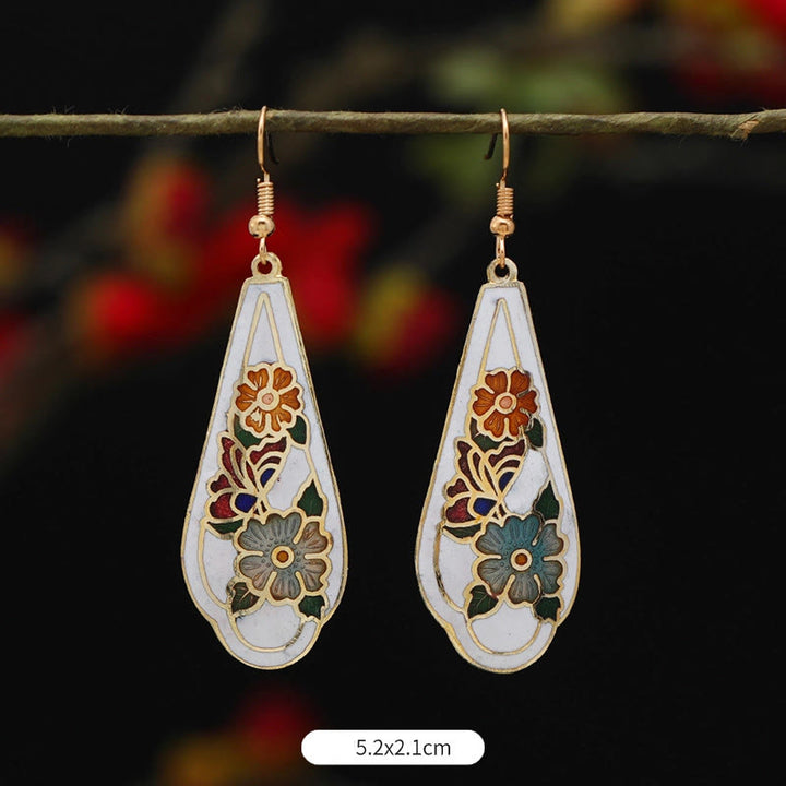 Boucles d'oreilles pendantes en alliage de cuivre avec Buddha Stones, fleur de lotus et papillon