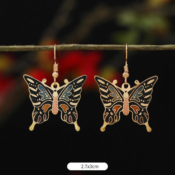 Boucles d'oreilles pendantes en alliage de cuivre avec Buddha Stones, fleur de lotus et papillon