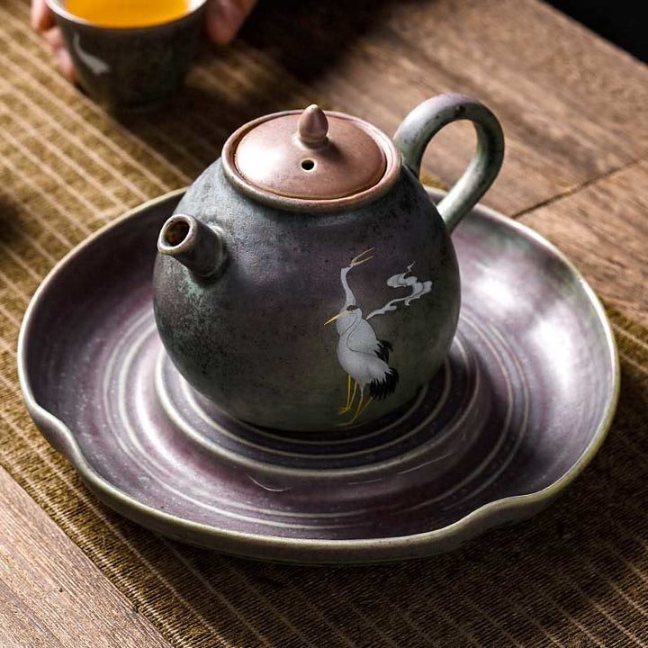 Théière Kung Fu en céramique avec Buddha Stones et grue blanche