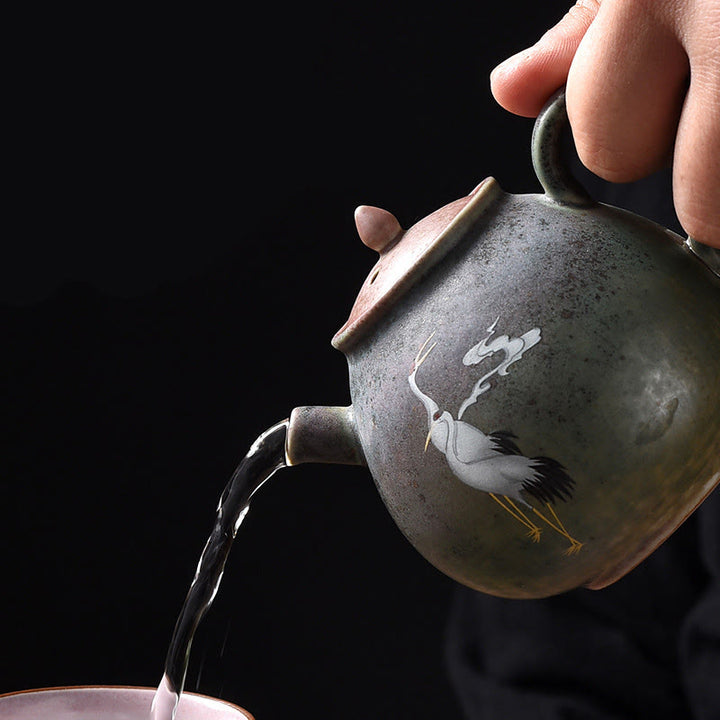 Théière Kung Fu en céramique avec Buddha Stones et grue blanche