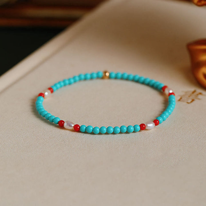 Bracelet de protection en petites perles d'agate rouge turquoise Buddha Stones
