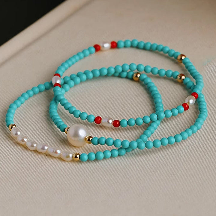 Bracelet de protection en petites perles d'agate rouge turquoise Buddha Stones