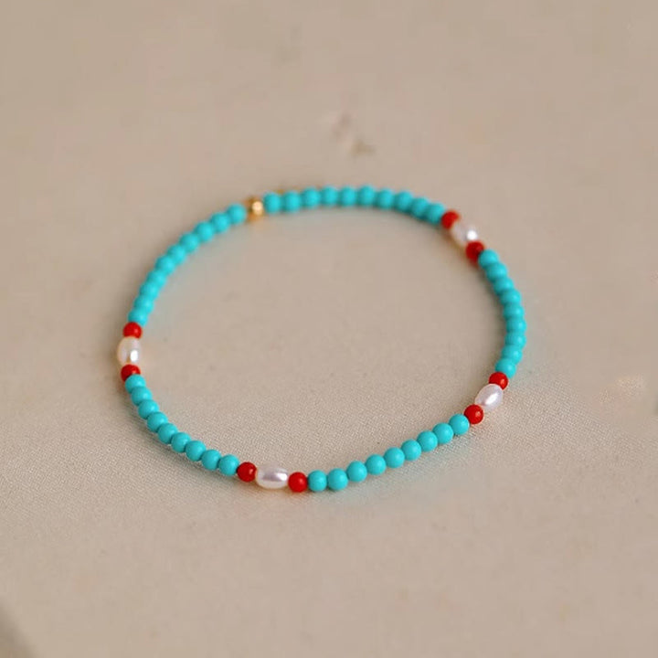 Bracelet de protection en petites perles d'agate rouge turquoise Buddha Stones