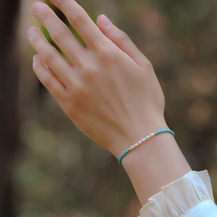 Bracelet de protection en petites perles d'agate rouge turquoise Buddha Stones