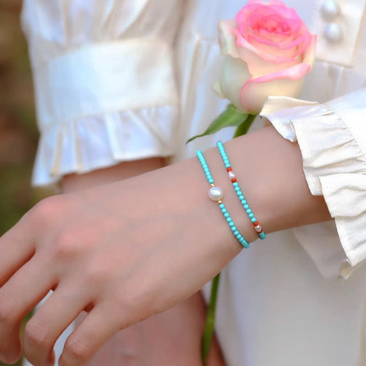 Bracelet de protection en petites perles d'agate rouge turquoise Buddha Stones