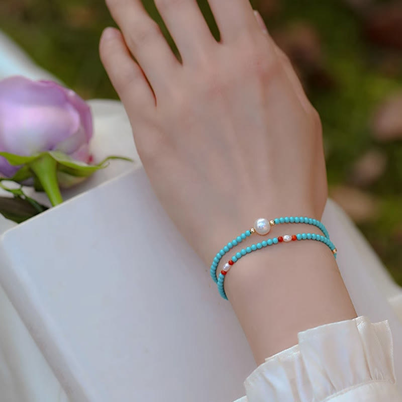 Bracelet de protection en petites perles d'agate rouge turquoise Buddha Stones
