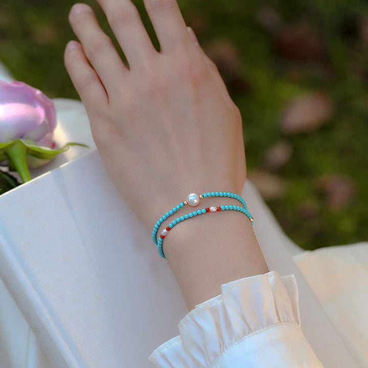 Bracelet de protection en petites perles d'agate rouge turquoise Buddha Stones