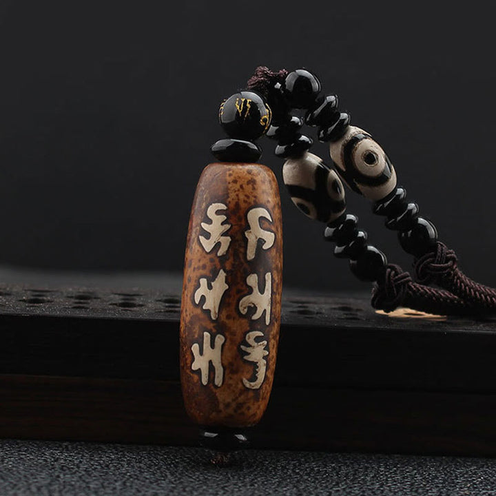 Buddha Stones du Tibet Om Mani Padme Hum Dzi, perle Avalokitesvara, motif de richesse - Perle Dzi - image 1