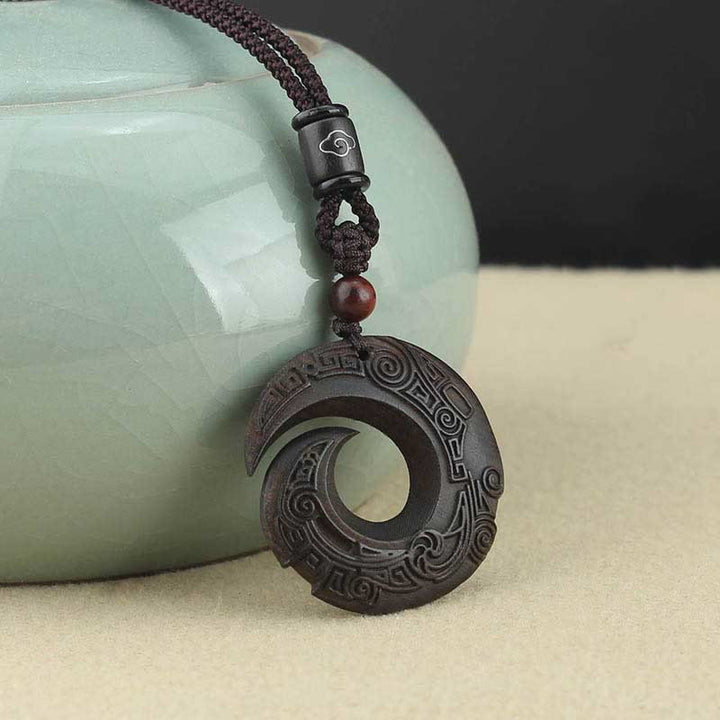 Buddha Stones d'ébène Bois de santal La chance améliore le motif de conception Collier pendentif de paix
