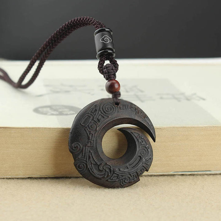 Buddha Stones d'ébène Bois de santal La chance améliore le motif de conception Collier pendentif de paix