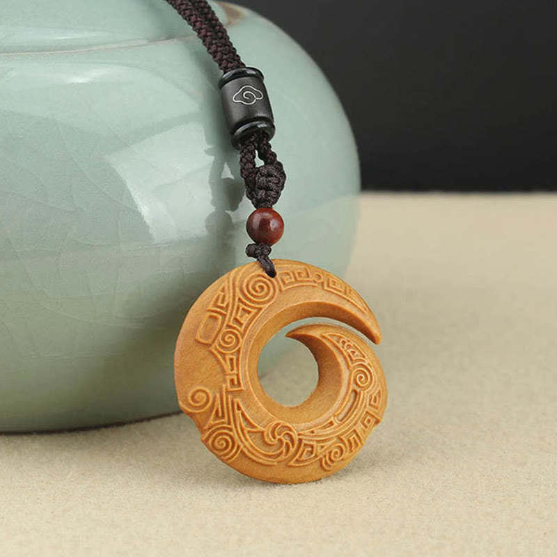Buddha Stones d'ébène Bois de santal La chance améliore le motif de conception Collier pendentif de paix